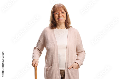 Mature woman standing with a walking cane