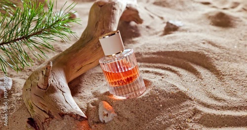 Intense golden perfume on sandy beach in summer.