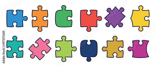 Colorful puzzle pieces in various shapes and vibrant hues scattered across a surface, representing problem-solving, teamwork, and connection.