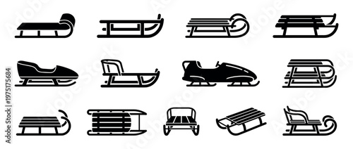 Collection of various sleds and toboggans for winter sports and recreation, including classic wooden and modern designs.