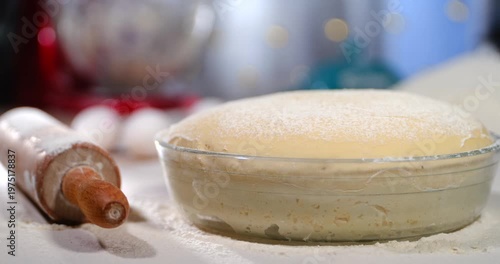 Timelapse yeast dough rising in kitchen background baking process