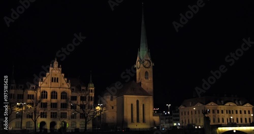 Illuminated Riverfront With Historic Charm. Serene Riverside View Featuring Glowing Facades And Lanterns
