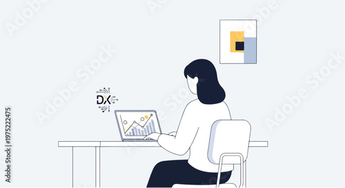 Woman working on laptop at desk