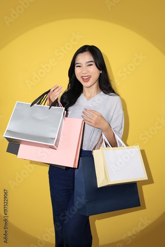 Young Asian Female Holding Paperbag