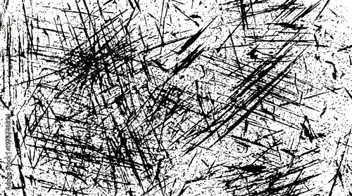 Abstract black ink scribbles and intersecting lines creating a dense monochrome texture.