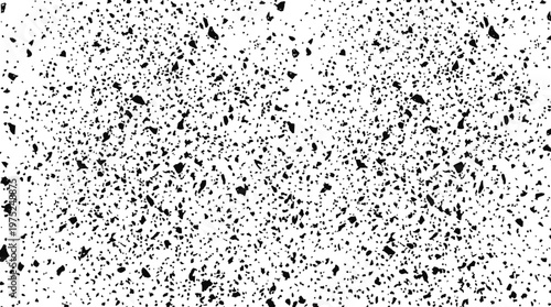 Abstract black and white speckle texture with random dotted pattern for design and background use.