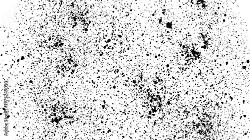 Abstract black and white speckled texture suitable as a grunge background for design projects.