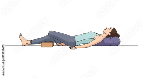 Woman Relaxing in Supported Reclined Bound Angle Pose with Yoga Props