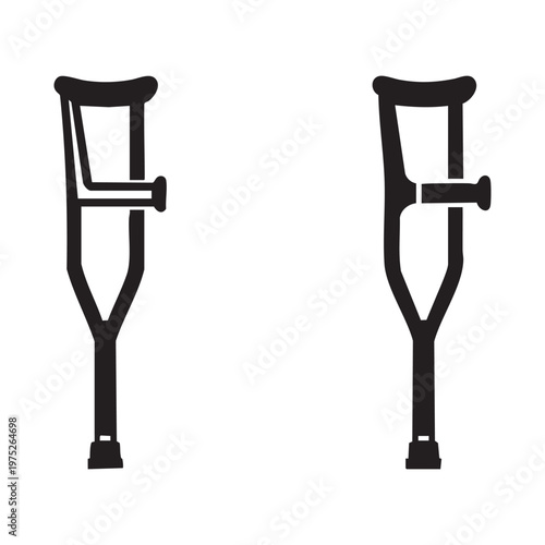 A pair of black crutches on a white background