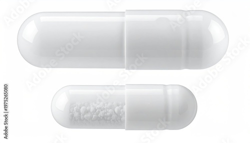Two white pharmaceutical capsule pills: one empty one filled with granules - medication isolated on a clean white backdrop