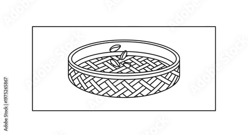 Handwoven bamboo steamer basket with tea leaves inside, traditional Asian cooking utensil