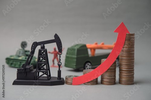 Crude oil pumpjack, raising red graph with stack coins and weapon war background. The oil price hiking impact of the war, energy crisis, supply shortage, recession and inflation global economy concept