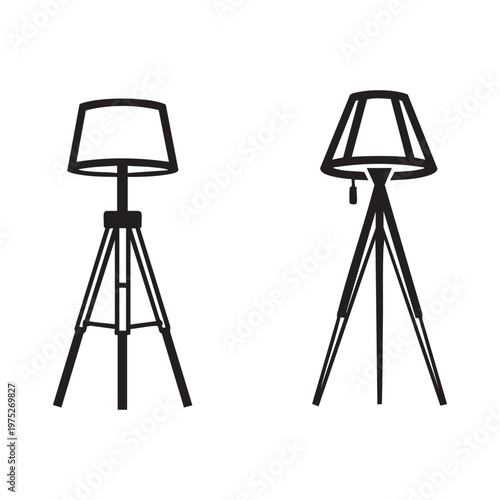 Two black tripod lamps with different shades
