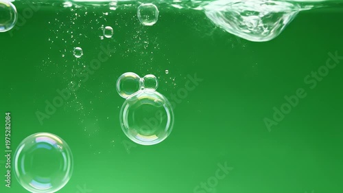 Green Bubbles Floating in Clear Green Water Scene.