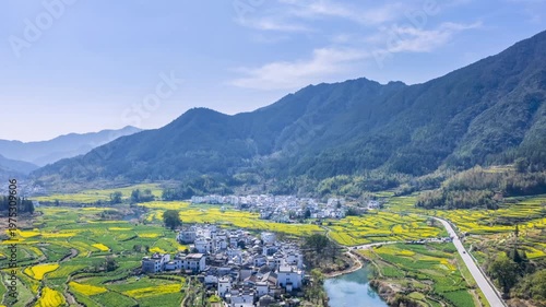 Wallpaper Mural Spring aerial time-lapse of rapeseed terraces and Huizhou-style villages in Jiangling, Wuyuan county, Jiangxi province, China. Torontodigital.ca
