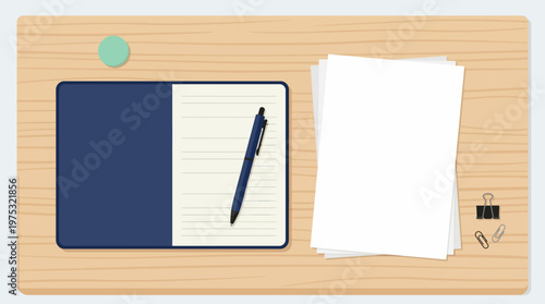 An open blue notebook with a pen and a stack of blank white paper for notes.
