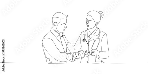 Female doctor and male patient whose hand hurts