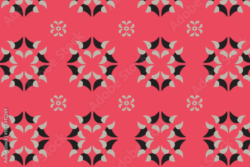 Coral and black geometric star floral seamless pattern featuring bold abstract blossoms in a repeating symmetrical grid