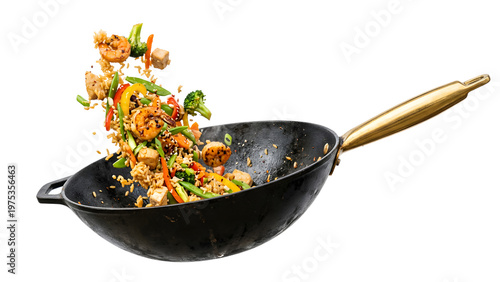Delicious shrimp and vegetable stir fry in a black wok isolated on transparent background
