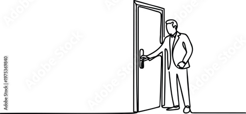 Man in a business suit opening a door slowly