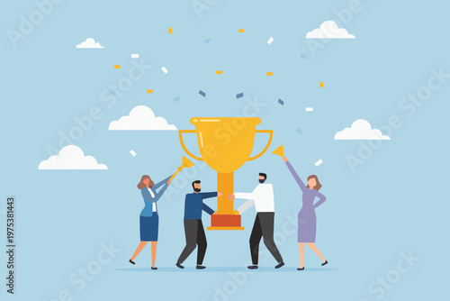 Team of business people celebrating a victory with a golden trophy