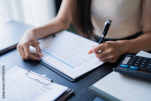 Two Asian businesswoman working together in office room