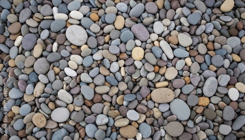 A close-up view of a collection of smooth, multicolored pebbles of various sizes and shapes.