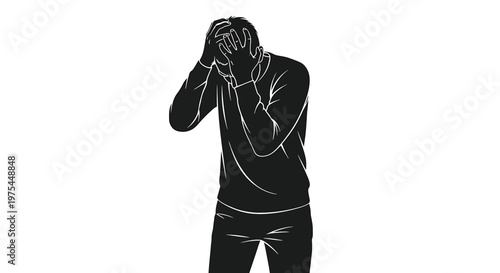 Stressed man holding his head in his hands, feeling overwhelmed, frustrated, or experiencing a headache