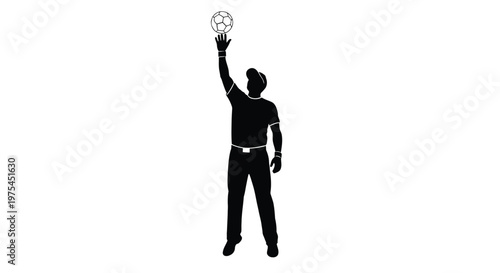 Silhouette of a soccer referee holding a ball up in the air