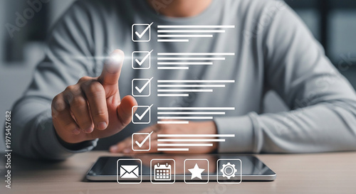 Digital Task Completion: An individual interacts with a digital checklist, symbolizing progress, organization, and efficient task management using modern technology. 