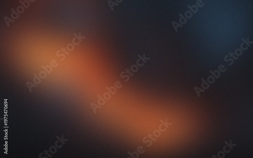 Abstract dark gradient background glowing orange light soft blur