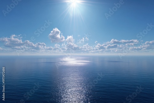 Bright Sunlight Glinting on the Deep Blue Ocean Under a Clear Sky with Puffy White Clouds