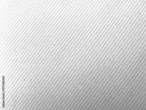Seamless white halftone pattern featuring fine grey dots arranged in a diagonal gradient across a clean white surface. 