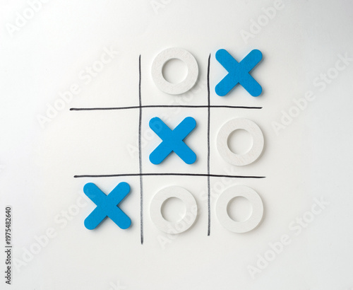 Tic-Tac-Toe game on white background. Themes of strategy, competition, decision-making, and problem -solving, making it highly marketable for business and educational content.