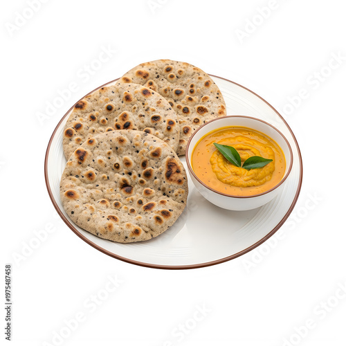 Traditional indian flatbread served with a bowl of yellow curry