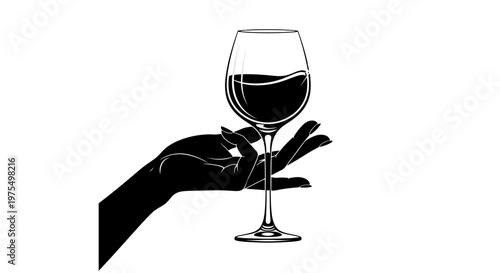 Hand holding a wine glass.