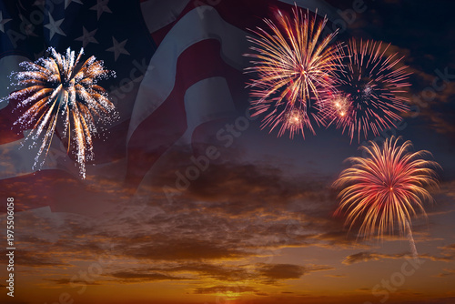 National flag of United States of America in sky with fireworks independence day