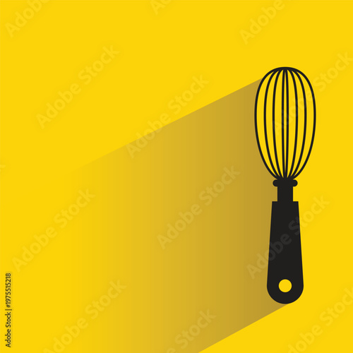 hand whisk icon with shadow on yellow background