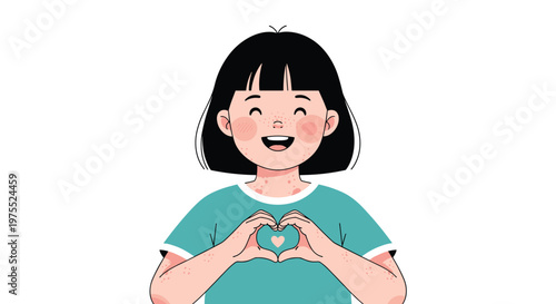 Happy young girl with black hair and freckles smiling while making a heart shape with her hands over her chest.