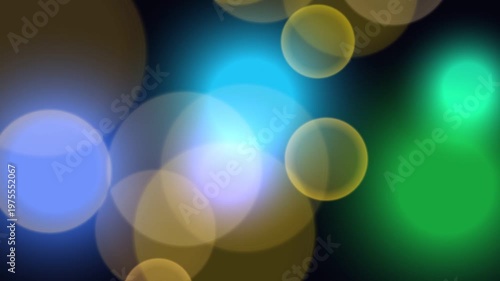 Abstract Bokeh Background with Colorful Glowing Light Circles in Green Blue and Gold
