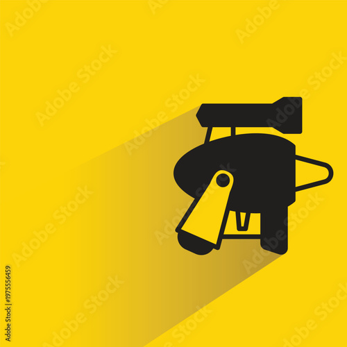space gun icon with shadow on yellow background