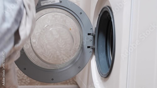 Loading laundry into the washing machine with simple steps