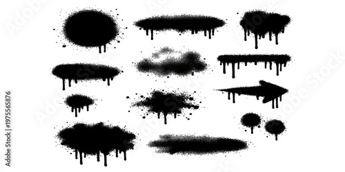 Black ink splash and blot silhouettes forming a set of tree and plant designs in a natural vector style