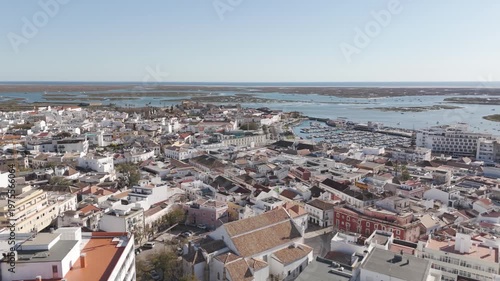 Aerial view of Faro cityscape with the marina visible in the distance.