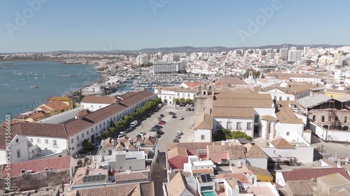 Smooth orbit highlighting the old town, landmark buildings, and cultural heritage at Largo da Sé.