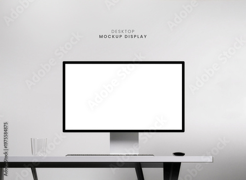 Desktop Computer Monitor Mockup on White Desk. Modern minimalist home office workstation. Minimal workspace with keyboard mouse and glass, professional office. Clean design for technology UI mock