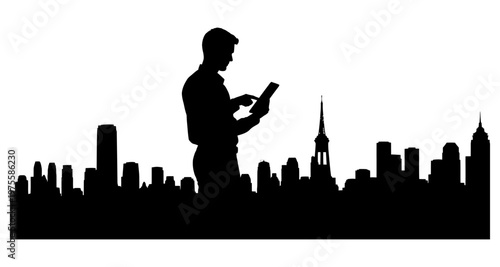 Silhouette of a man using a tablet against a city skyline at dawn