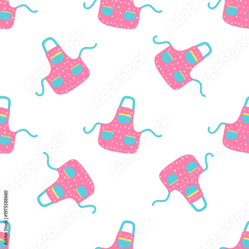 Cute pink aprons with polka dots and pockets arranged in a seamless pattern on a transparent background
