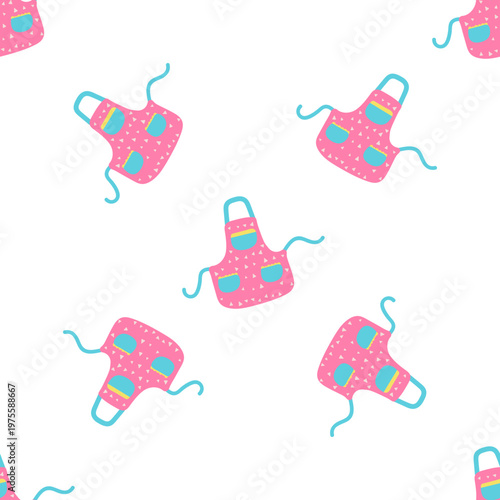 Seamless pattern of pink aprons with blue accents and polka dots on a transparent background
