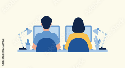 Two people working on computers at office desks